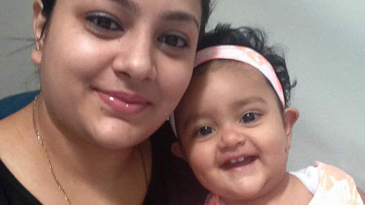 Sofina Nikat with her baby daughter