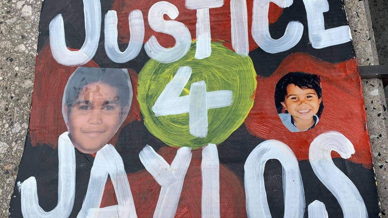 A sign from a rally, calling for justice for Jaylen Clark Close 