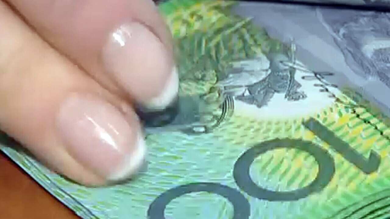 aussie_dollar_120106_L_sbs_732381273