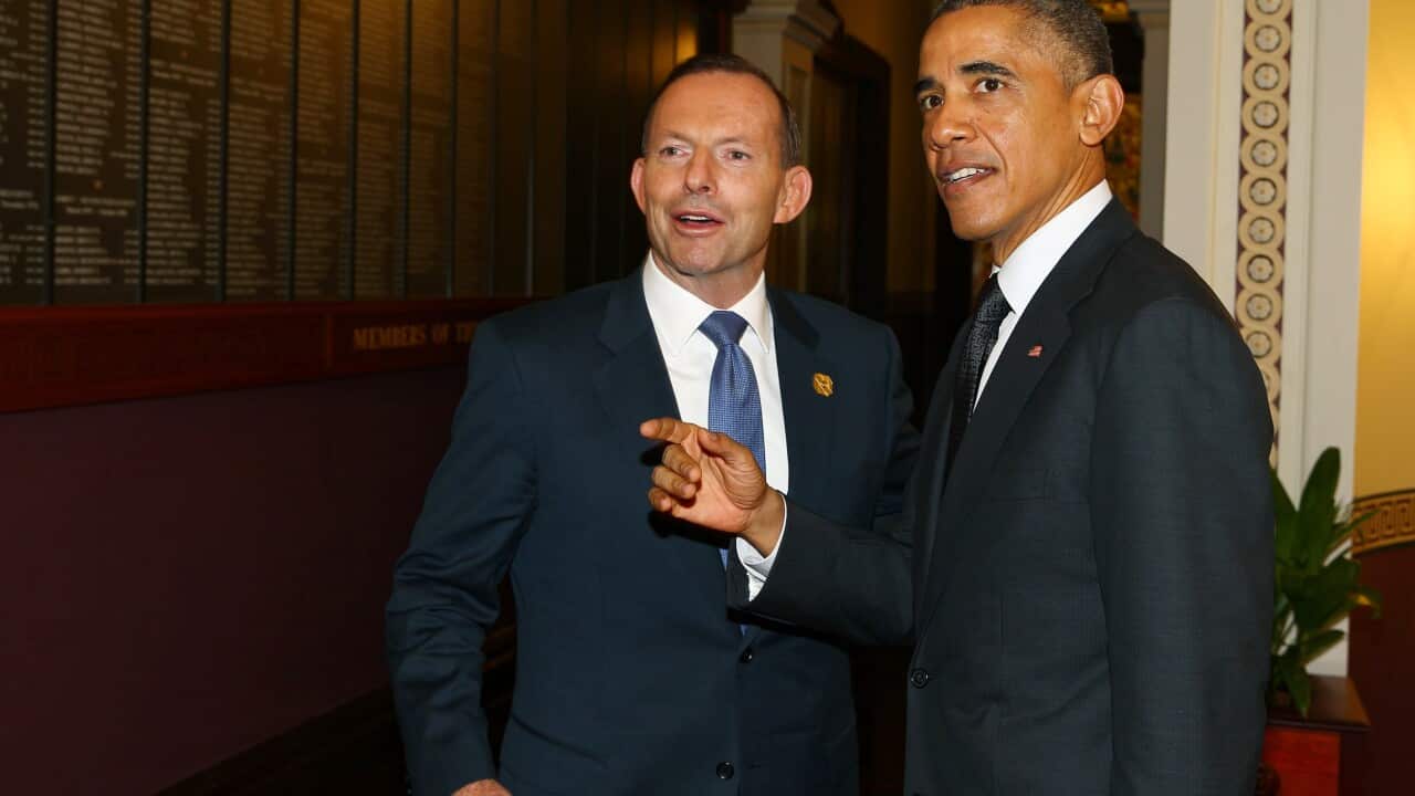 Tony Abbott greets Barack Obama during the G20 Leaders' Summit