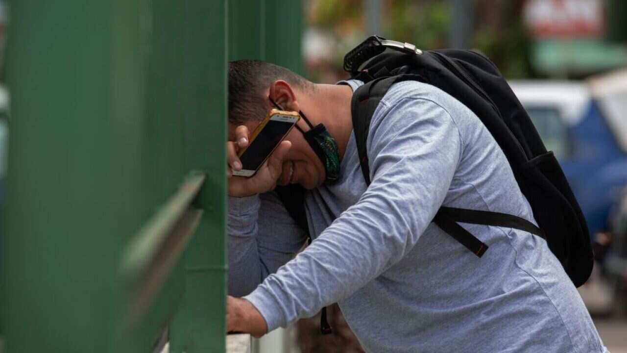 A man is seen outside the 28 de Agosto Hospital in Manaus, on 14 January, 2021