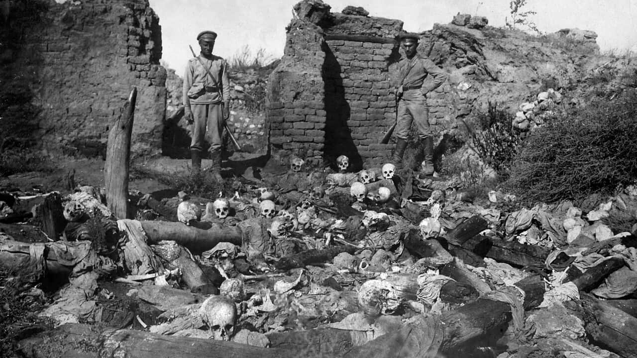 A picture released by the Armenian Genocide Museum-Institute dated 1915 purportedly shows soldiers standing over skulls of victims from the Armenian village of Sheyxalan in the Mush valley, on the Caucasus front during the First World War. 