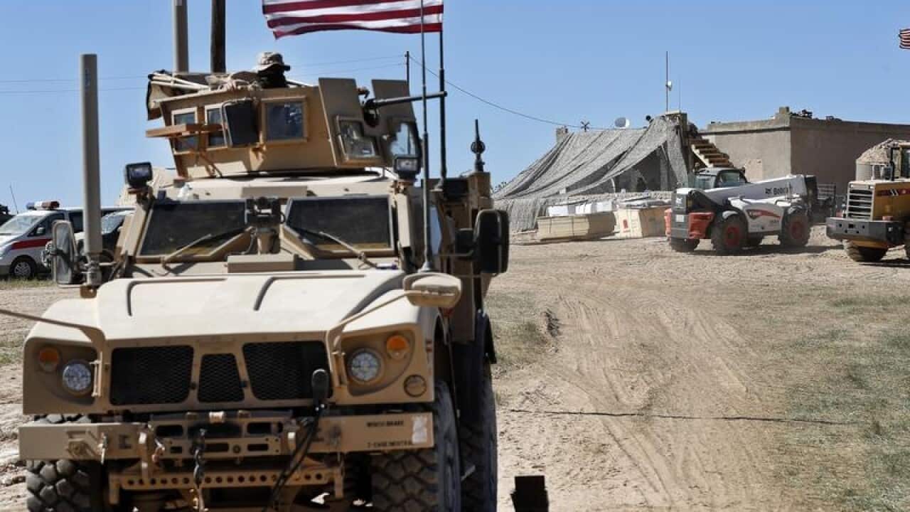 A file image of a US armoured vehicle in Syria