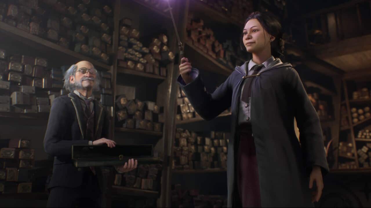 A character in a Harry Potter video game holds a wand