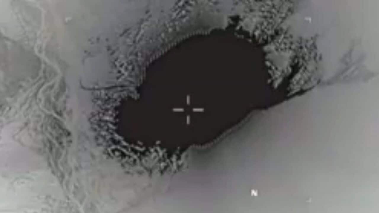 A handout still from the US Department of Defense showing a Massive Ordnance Air Blast (MOAB) bomb striking Islamic State militants.