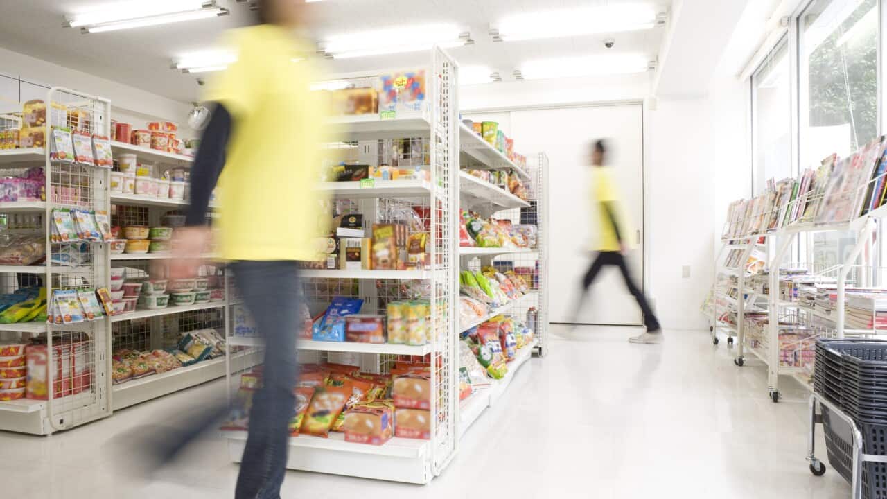Workers at a convenience store