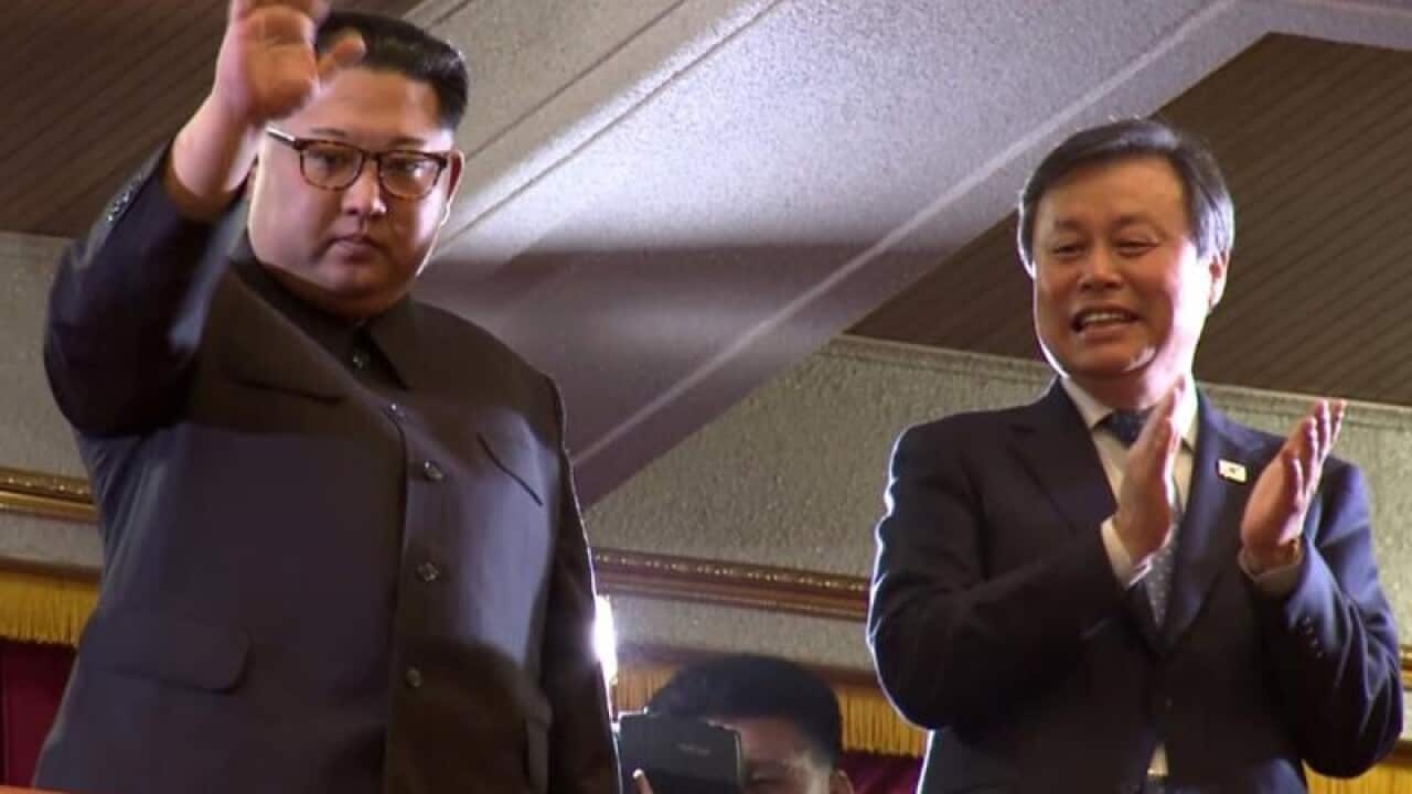 Kim Jong-un and South Korea's Culture Minister Do Jong-hwan