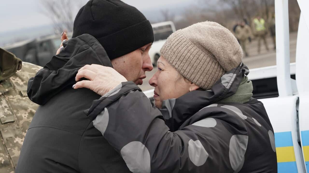 A Ukrainian war prisoner embraces his mother after been released after a prisoner exchange.