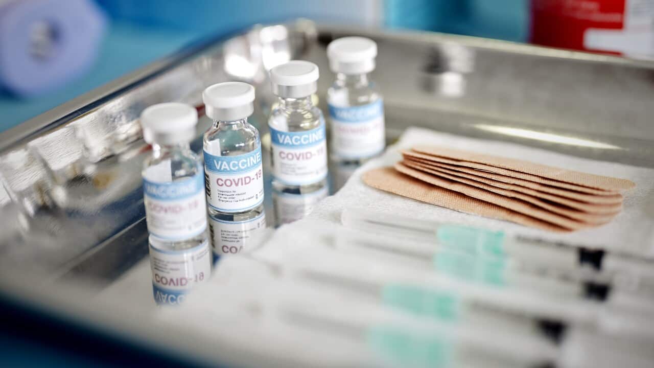Vials With the Covid-19 Vaccine and Syringes are Displayed On a Tray at the Corona Vaccination Center