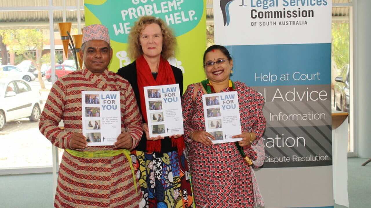 SA Legal Services Commission director Gabrielle Canny with migrants from Adelaide's Bhutanese community.