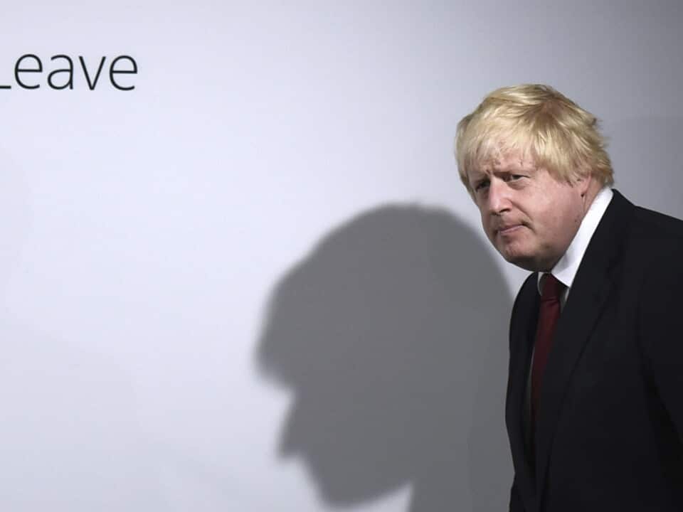 FILE - In this Friday, June 24, 2016 file photo, Vote Leave campaigner Boris Johnson arrives for a press conference at Vote Leave headquarters in London, He was the mayor who reveled in the glory of hosting the 2012 London Olympics, and the man who led the Conservatives to a whopping election victory on the back of his mission to “get Brexit done.” But Boris Johnson’s time as prime minister was marred by his handling of the coronavirus pandemic and a steady stream of ethics allegations. (Mary Turner/Pool via AP, File)