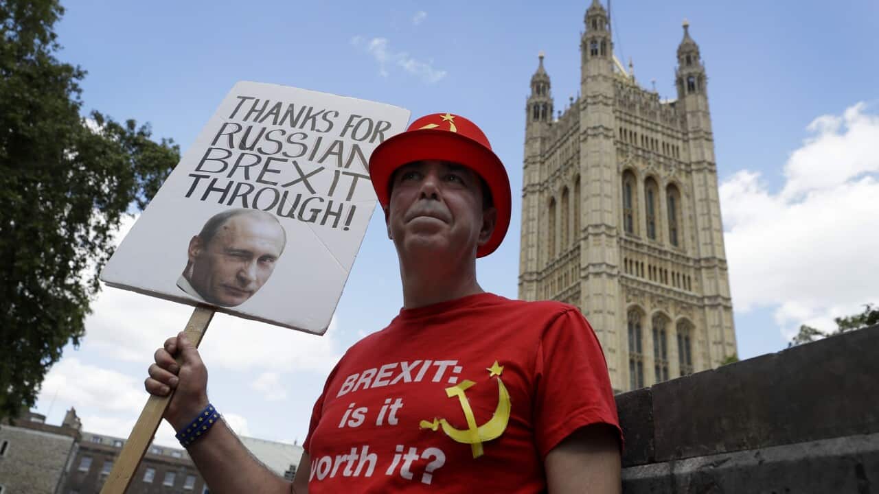 Anti Brexit campaigner Steve Bray holds up a banner outside Parliament in London
