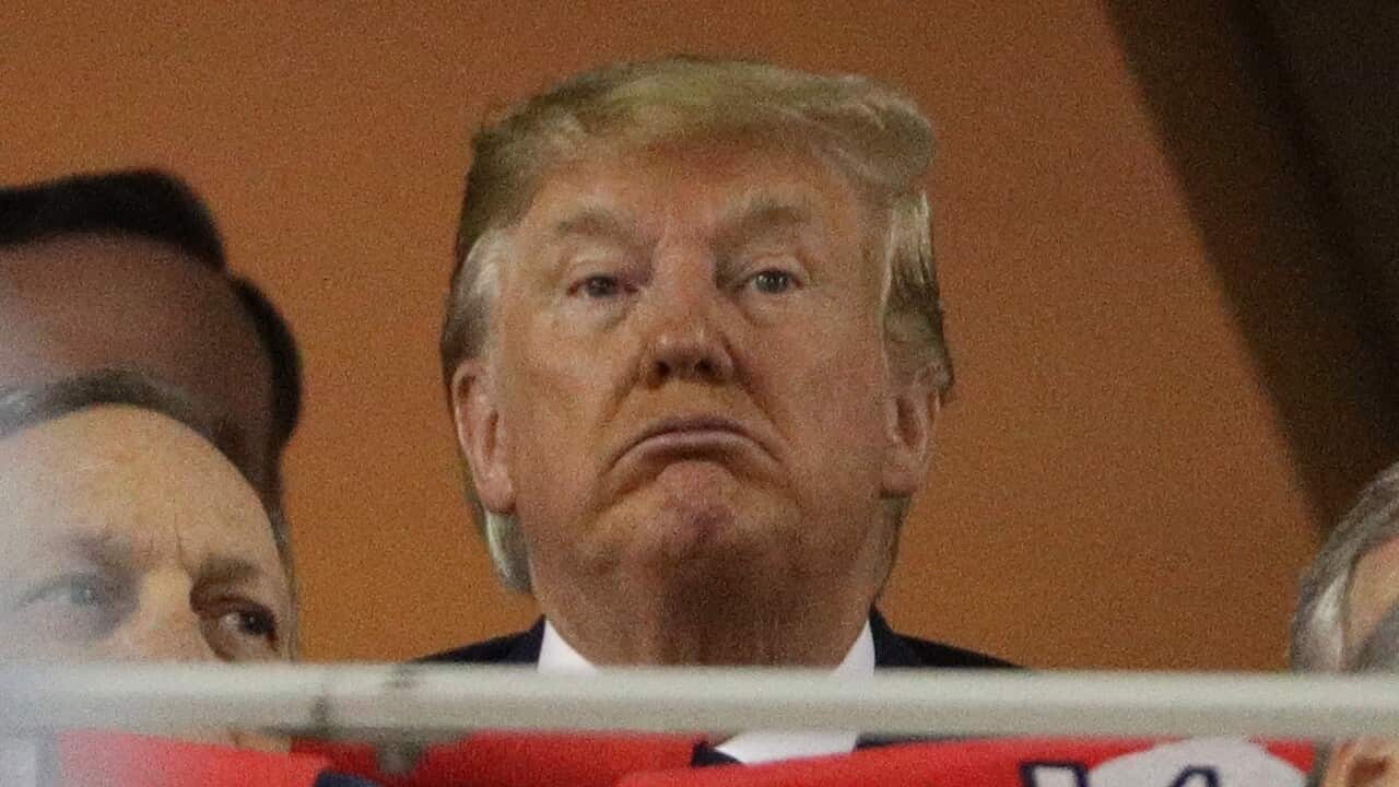 Donald Trump attends Game Five of the 2019 World Series between the Houston Astros and the Washington Nationals.