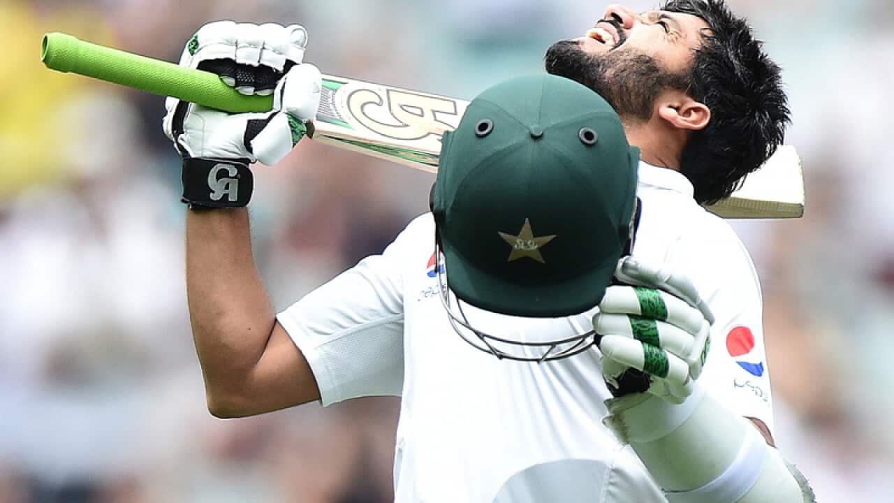 Pakistan batsman Azhar Ali celebrates after scoring a century