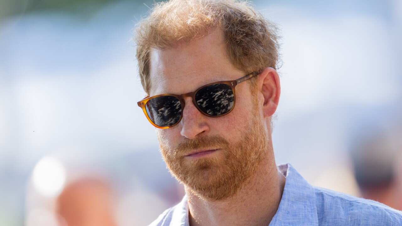Prince Harry settles case against Sun publisher