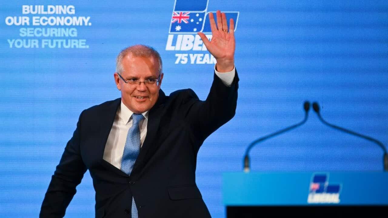 Scott Morrison waves after speaking at the 61st Federal Council of the Liberal Party of Australia at the Hyatt Hotel in Canberra.