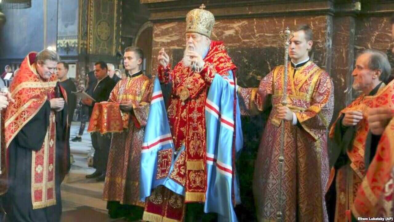 Patriarch Filaret, head of the Ukrainian Orthodox Church of the Kyiv Patriarchate, conducts a service at the St. Volodymyr Cathedral in Kyiv (AP).