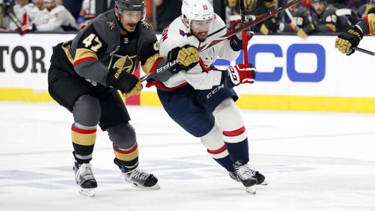 Luca Sbisa (L) and Chandler Stephenson