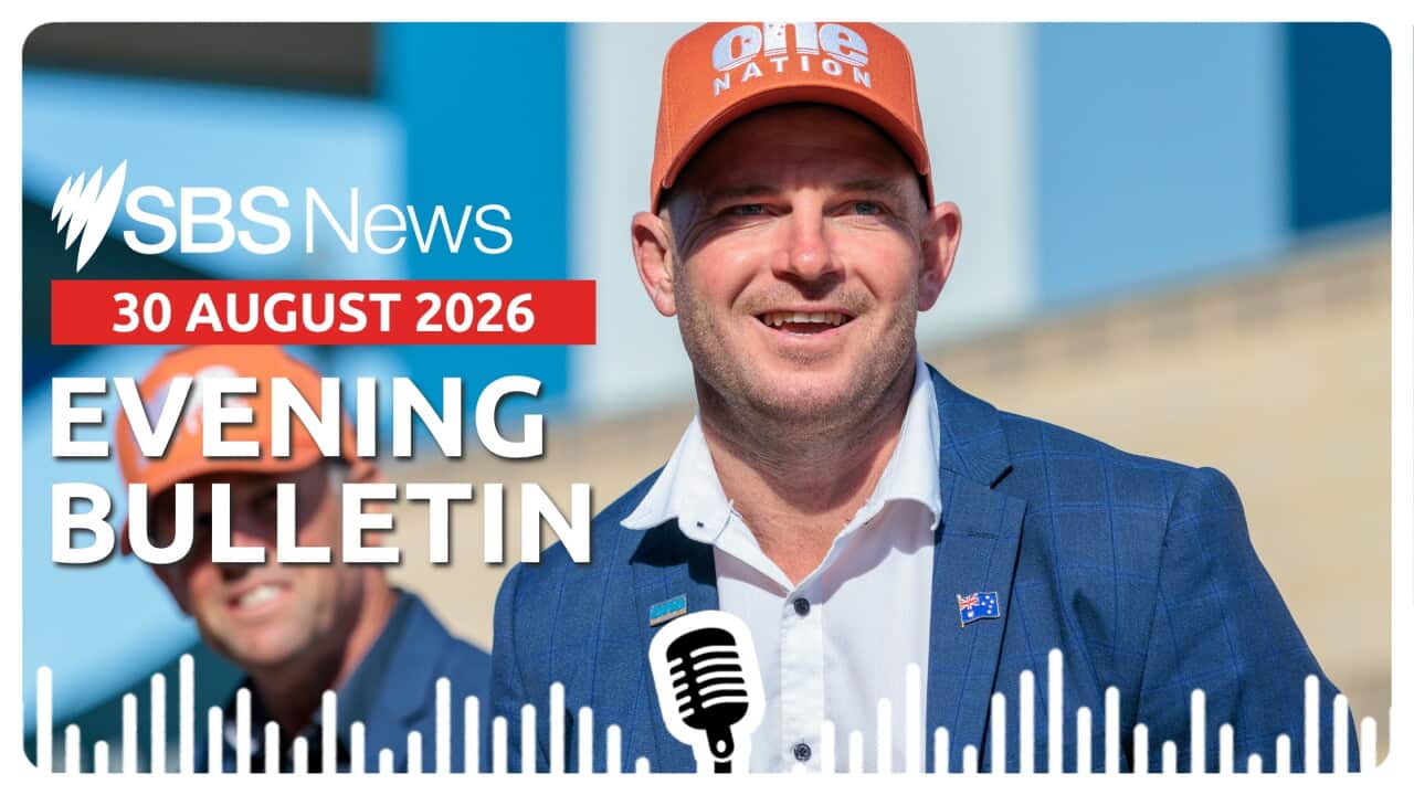 WA One Nation candidate for Secret Harbour Luke Herdegen smiles as he wears a One Nation orange cap.