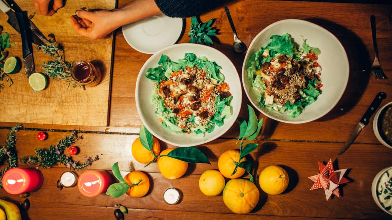 Preparing and cooking meal in kitchen