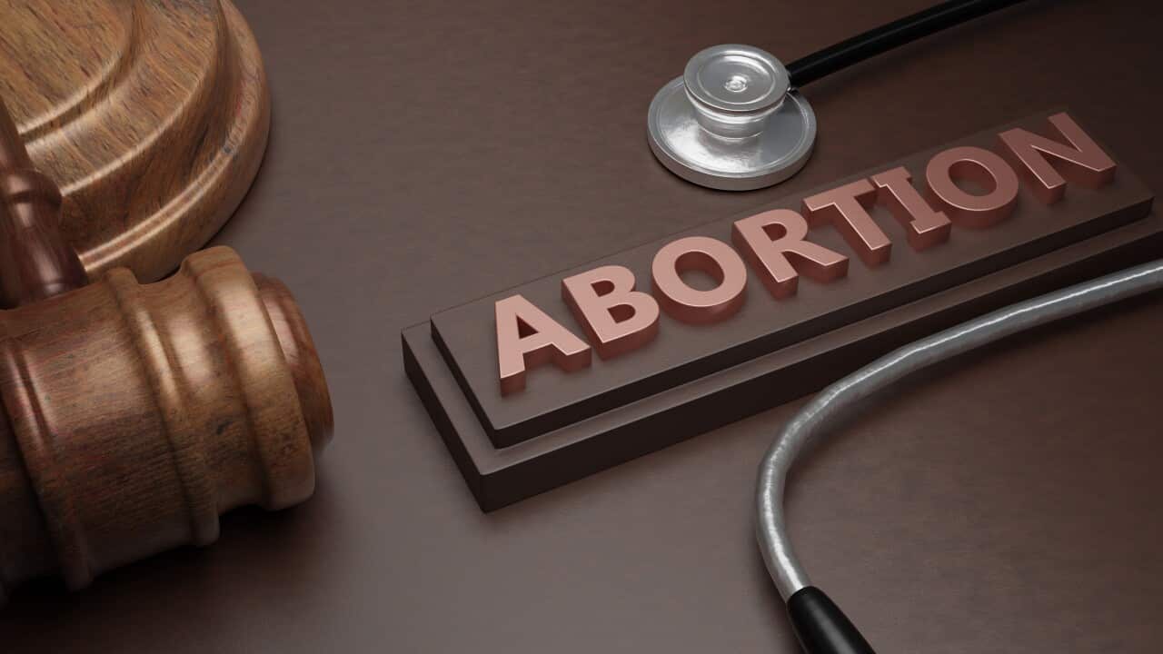 Abortion law and Health. Legal or illegal. Text, medical stethoscope and judge gavel. 3D Render Text and judge gavel. 3D Render