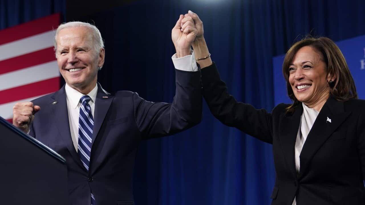 President Joe Biden and Vice President Kamala Harris stand on stage at the Democratic National Committee winter meeting, Feb. 3, 2023, in Philadelphia.