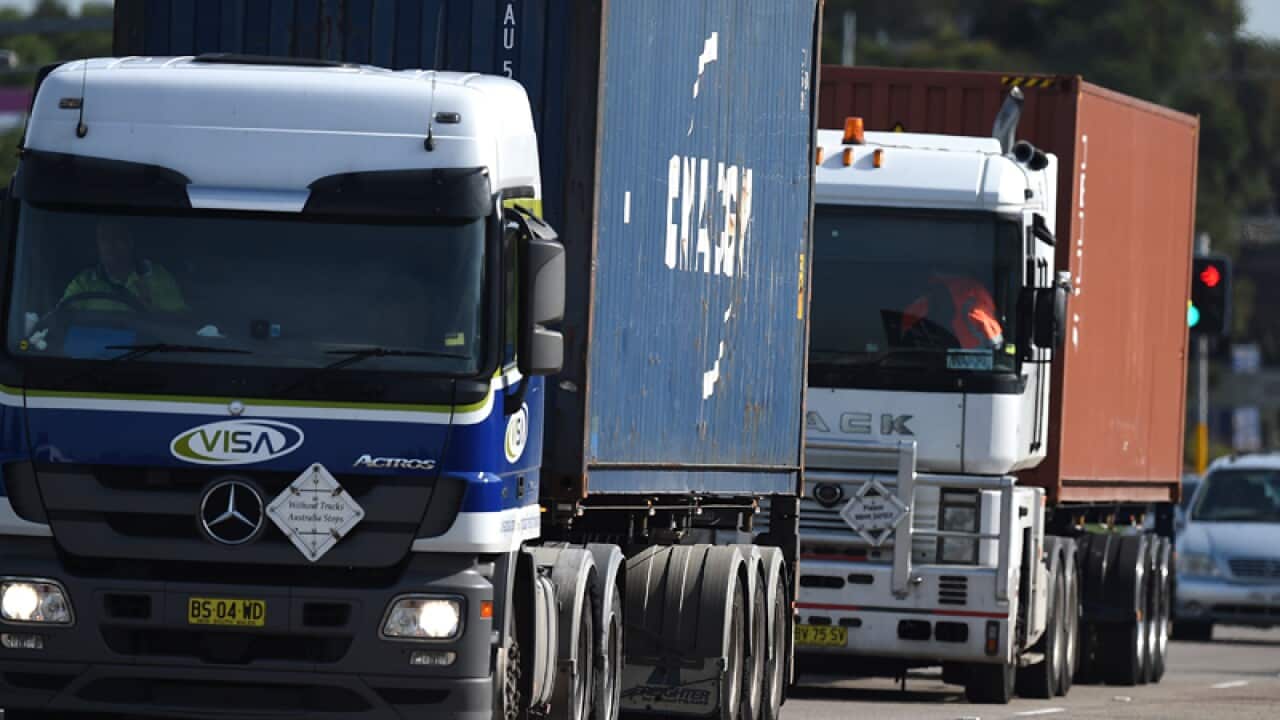 Trucks are seen on road