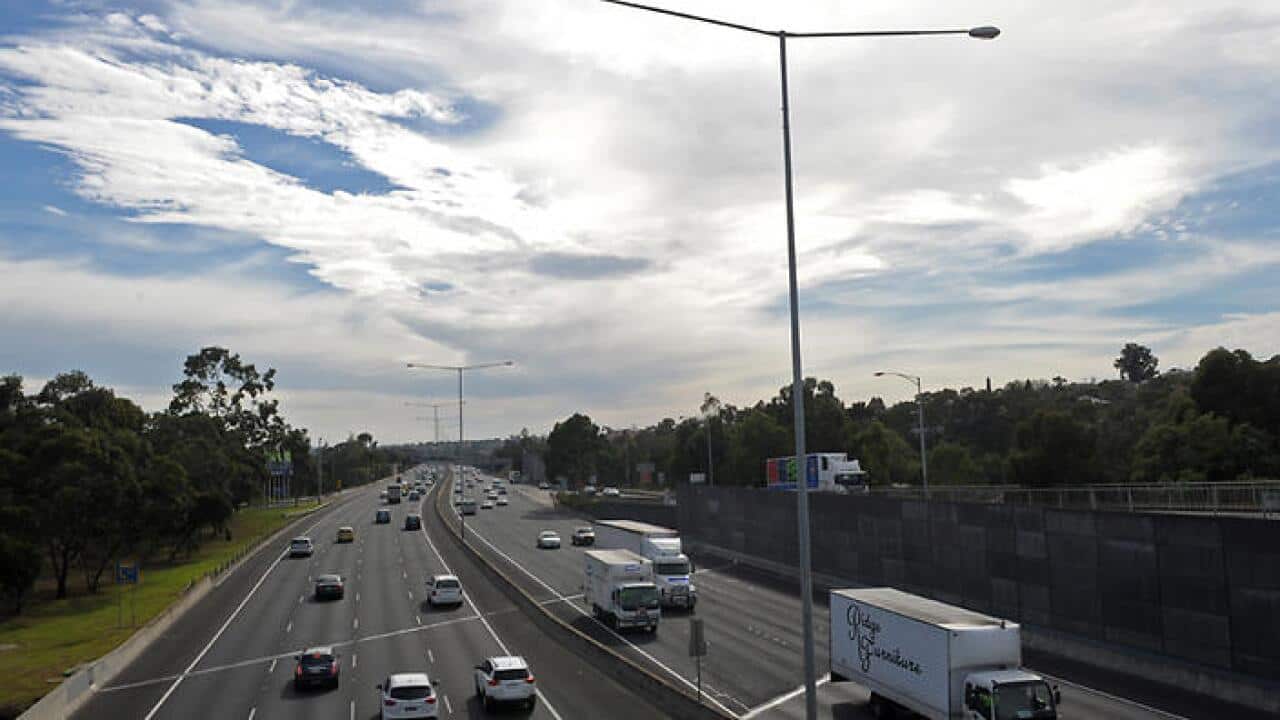 The deaths of a motorcycle rider and pillion passenger takes the national holiday road toll to 33. (AAP)
