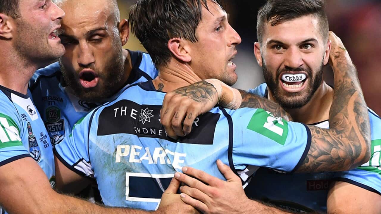 Mitchell Pearce with team mates