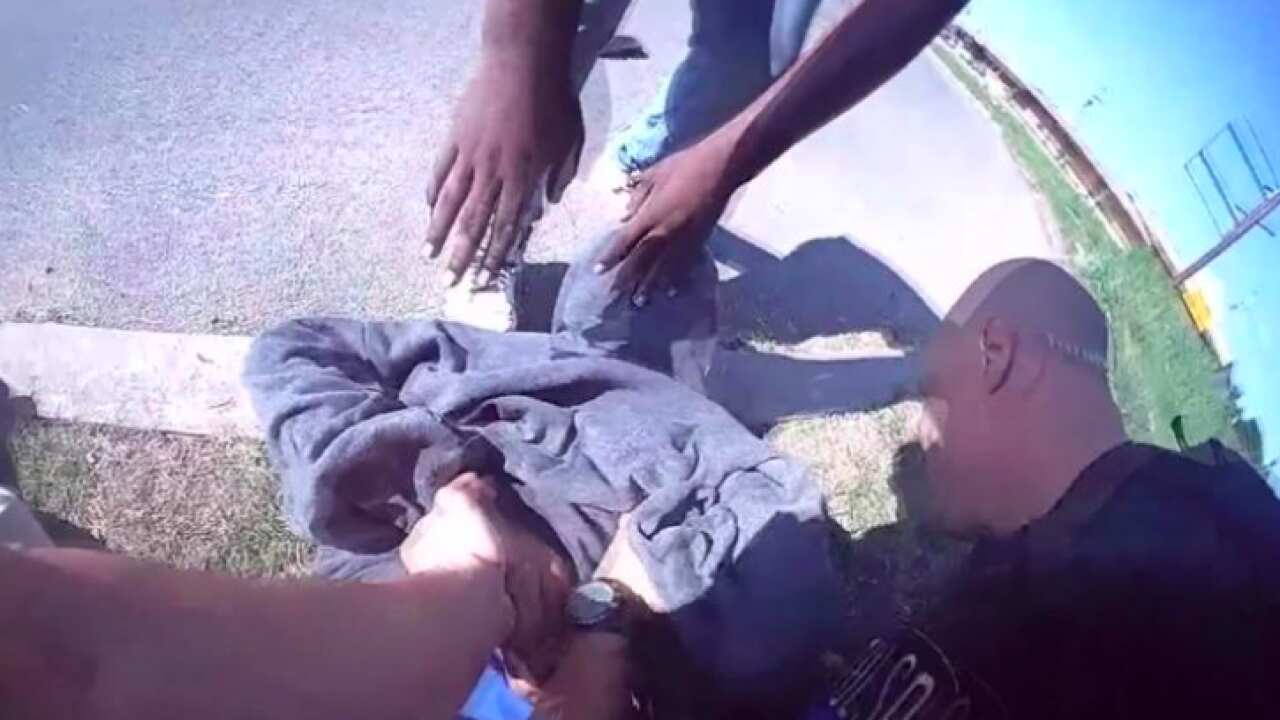 Body camera footage has been released after white officers in the United States arrested a black teenager and handcuffed a second for allegedly jaywalking.