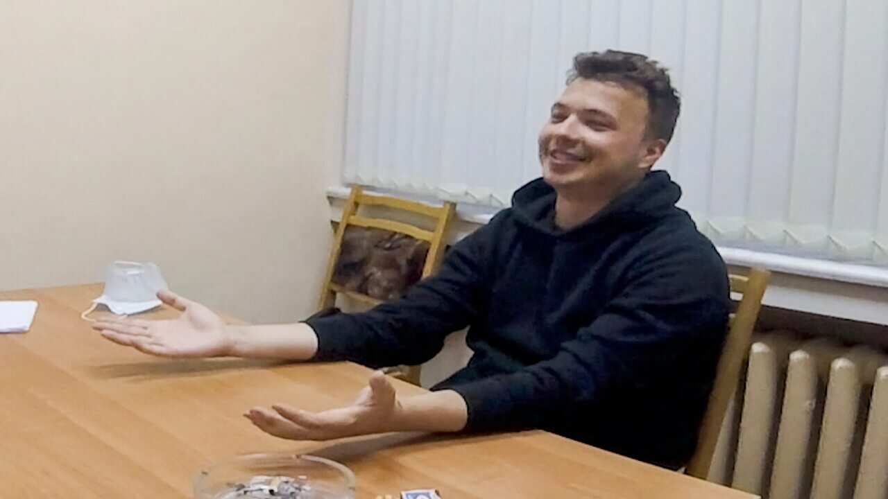 In this photo released by ONT channel on Wednesday, 2 June 2021, dissident journalist Raman Pratasevich speaks in a video from a detention centre in Minsk.