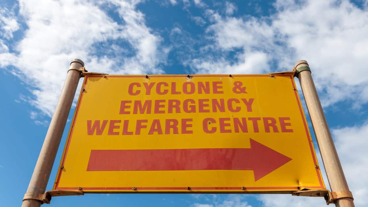 A cyclone emergency sign