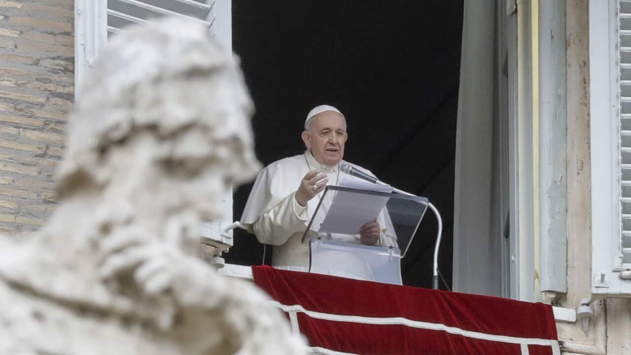Pope Francis delivers his message from the window of his studio overlooking St.Peter's Square