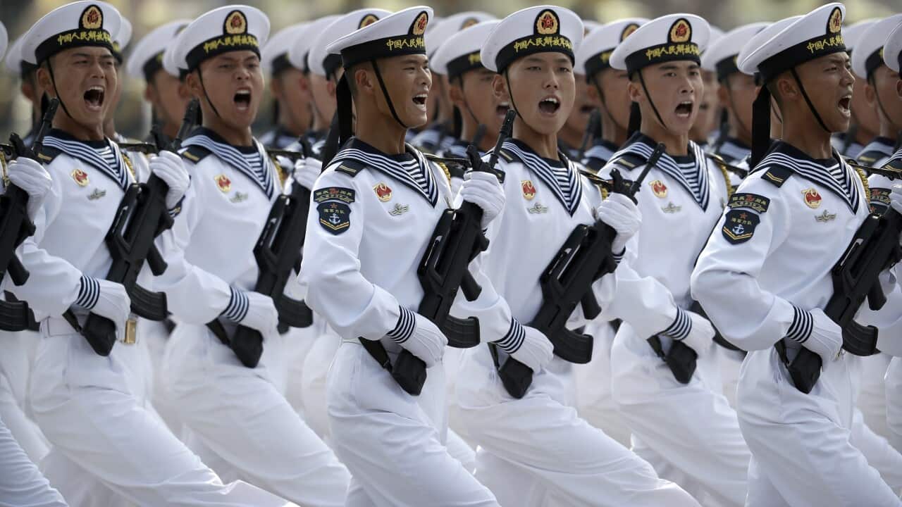 Soldiers from PLA navy march in the parade to commemorate the 70th anniversary of the founding of Communist China in Beijing, Oct. 1, 2019.