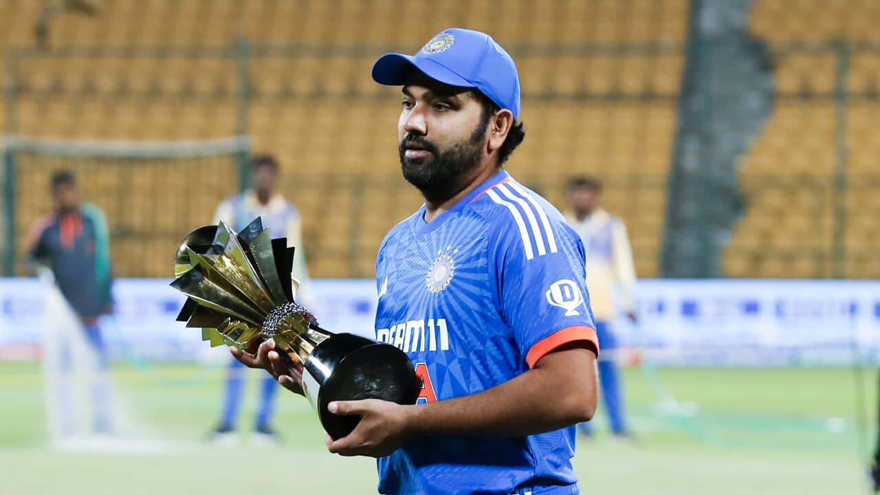 Rohit Sharma with the trophy after winning the 3rd T20I match against Afghanistan