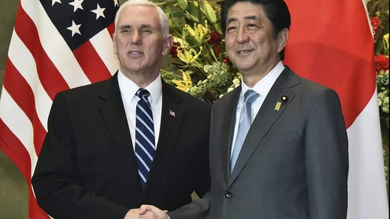 Vice President Mike Pence (L) and Japan's prime Minister Shinzo Abe.