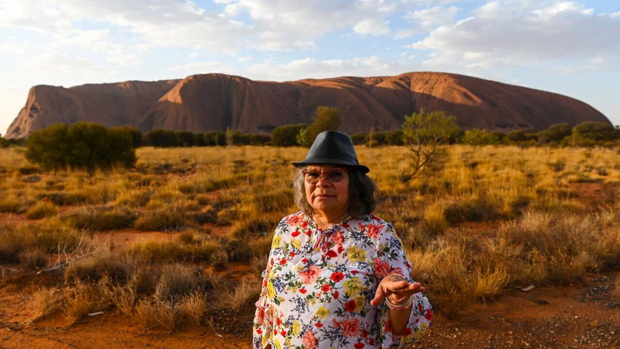 Anagu Aboriginal leader Dorothea Randall poses for photographs at Mutitjulu community near Uluru, also known as Ayers Rock at Uluru-Kata Tjuta National Park in the Northern Territory, Saturday, October 12, 2019. (AAP Image/Lukas Coch) NO ARCHIVING