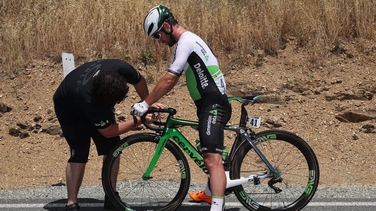 Mark Cavendish (Dimension Data) waits for his bike to be fixed after a mechanical in the final 12 kilometres of stage 5 of the Tour of California (Getty)