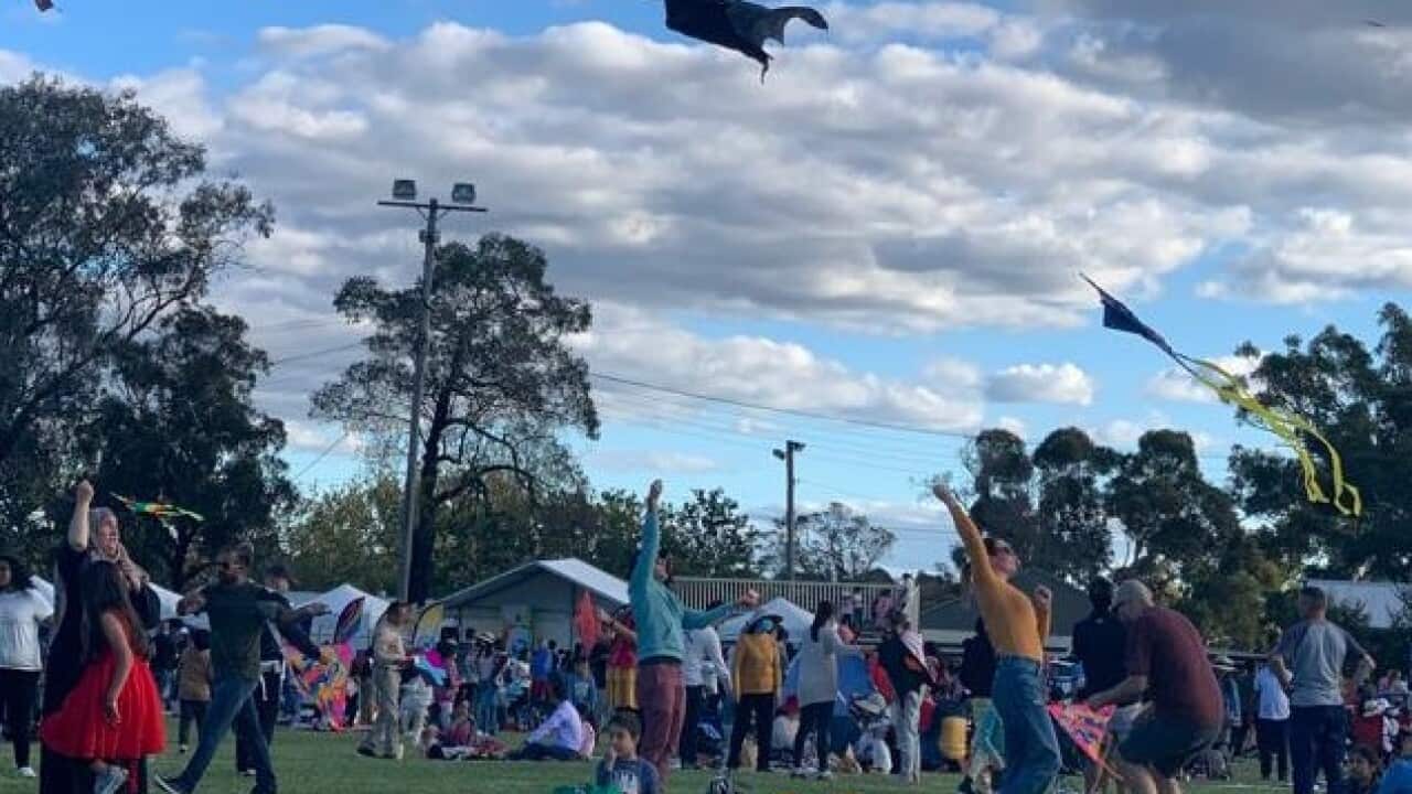 People enjoying kite flying