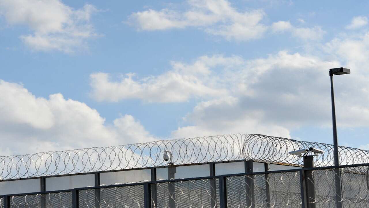 A perimeter fence at a jail