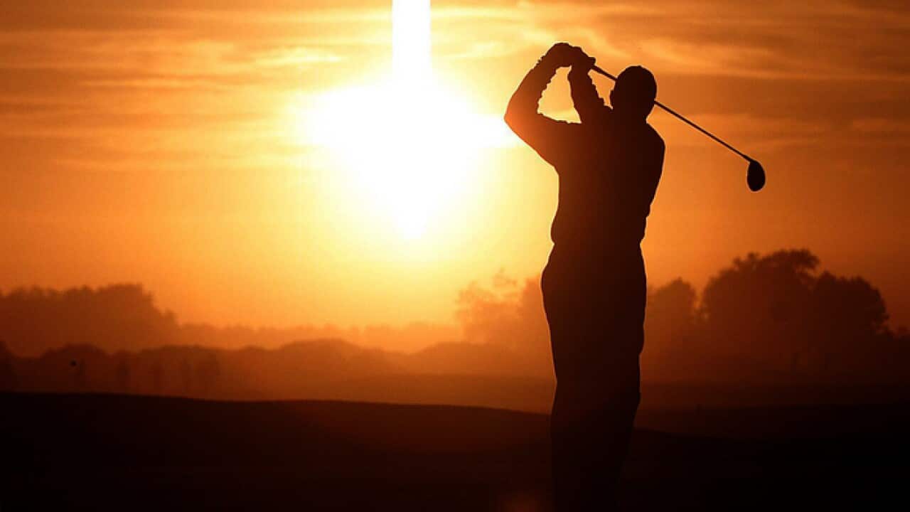 File photo of a man playing golf.