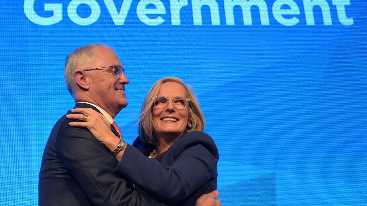 Australian Prime Minister Malcolm Turnbull, left, is congratulated by his wife Lucy