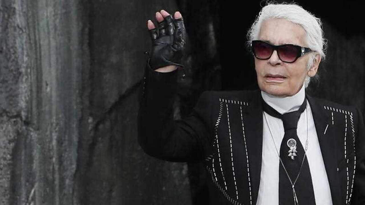 Karl Lagerfeld appears on the catwalk in 2018.
