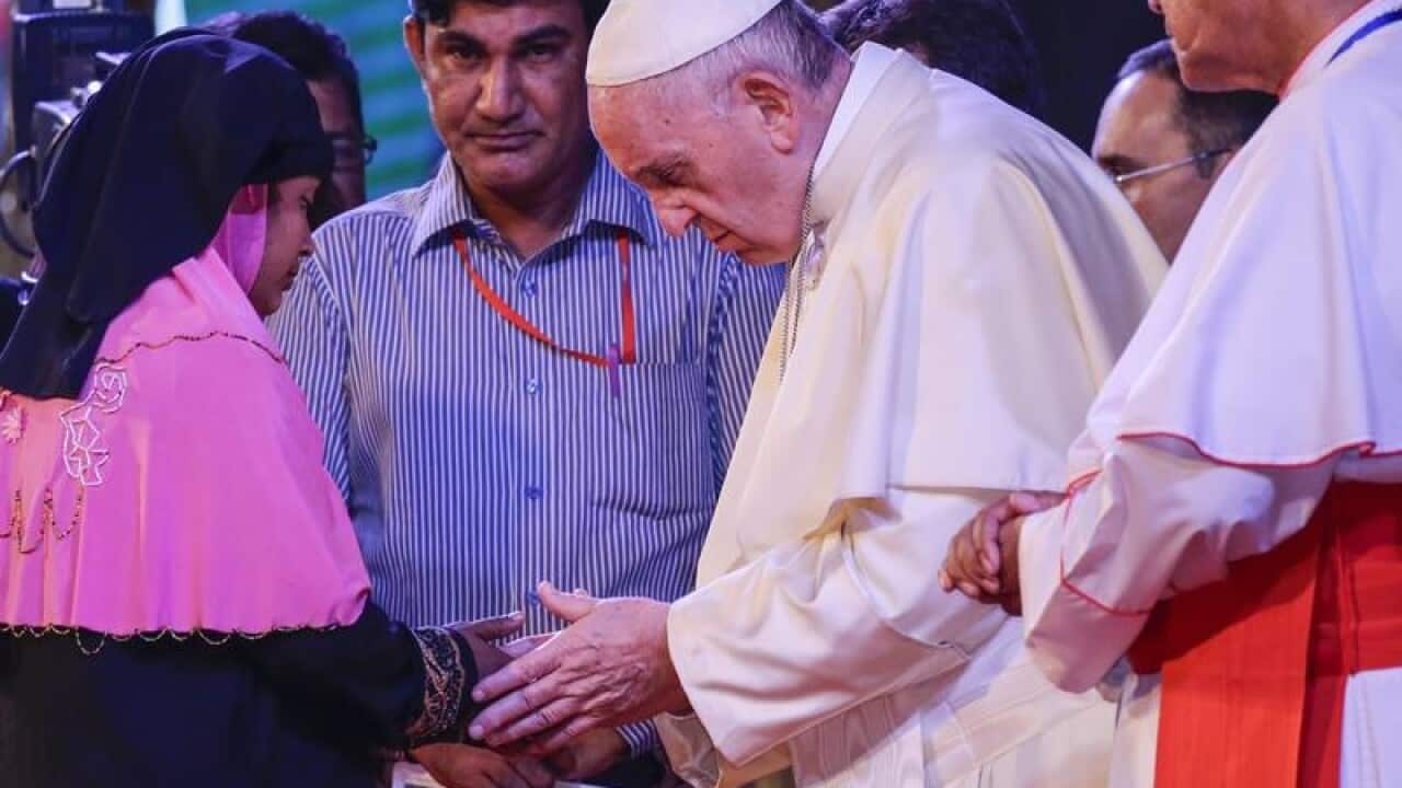 Pope Francis has used the word Rohingya, which he'd earlier avoided.