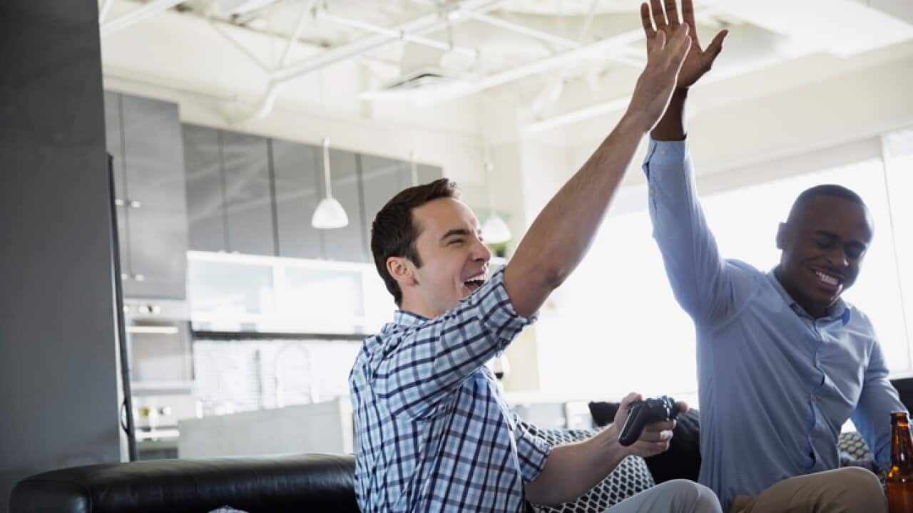 Men playing video games