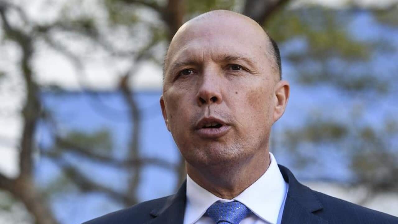 Peter Dutton says people smugglers will celebrate if Bill Shorten wins the next election.