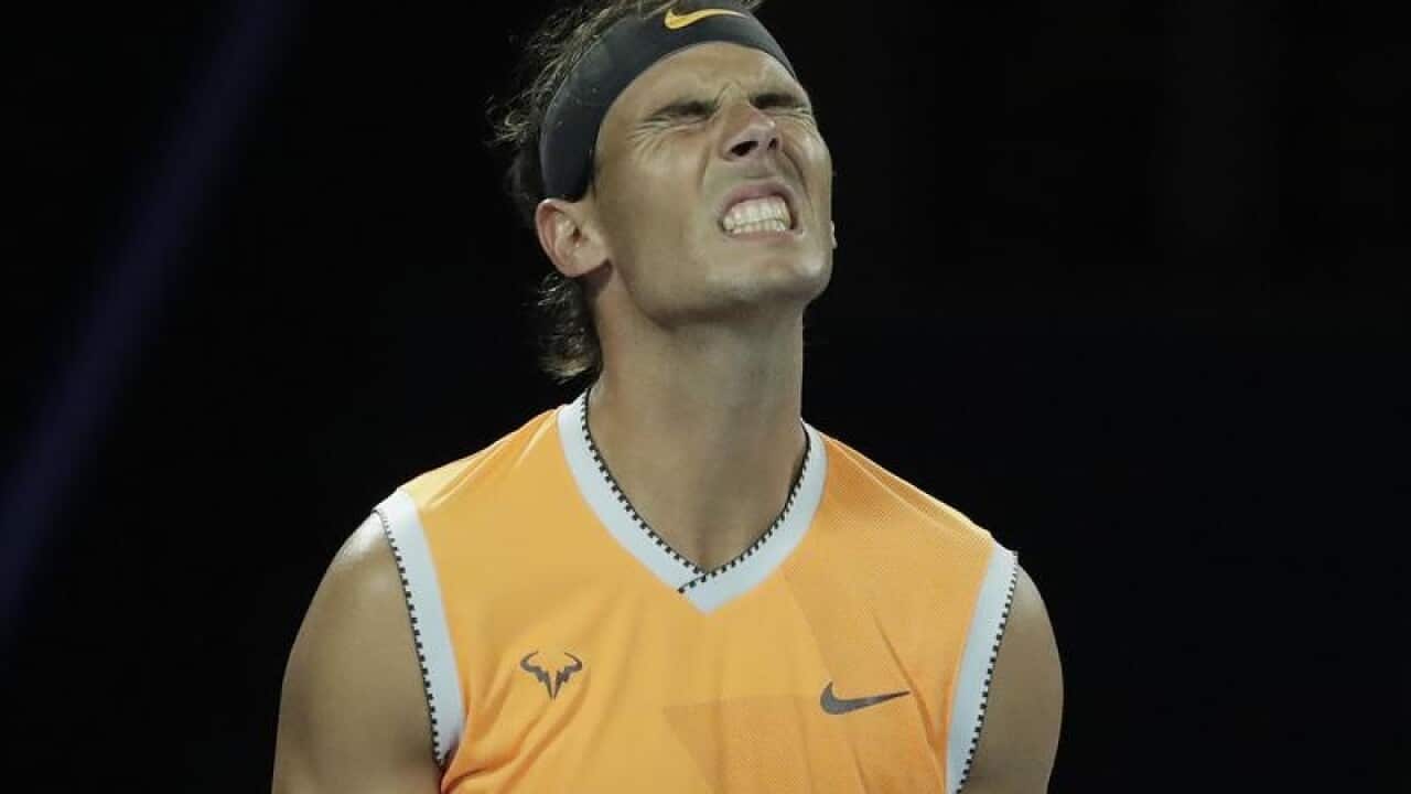 Rafael Nadal of Spain reacts.