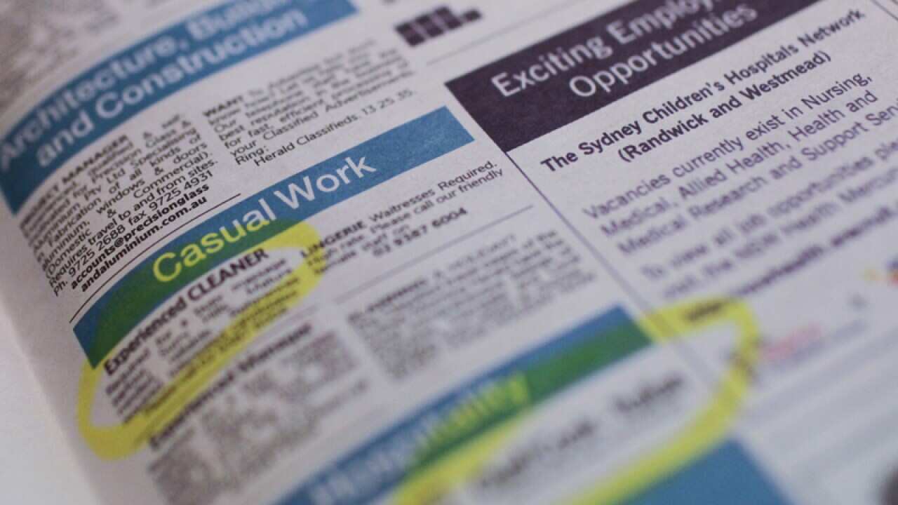 photo of job advertisements in a newspaper in Canberra