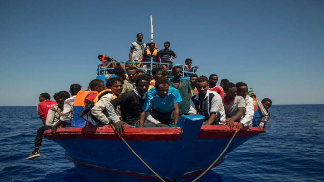 Migrants stranded at sea