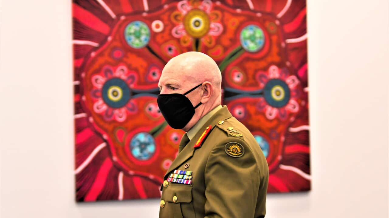 COVID-19 Taskforce Commander, Lieutenant General John Frewen arrives to address the media during a press conference in Canberra, Tuesday, July 6, 2021.